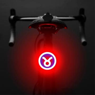 3664 Luz traseira de bicicleta criativa IPX2 à prova de água Luz LED pequena para bicicleta com suporte de carregamento USB para ciclismo ao ar livre - Taurus